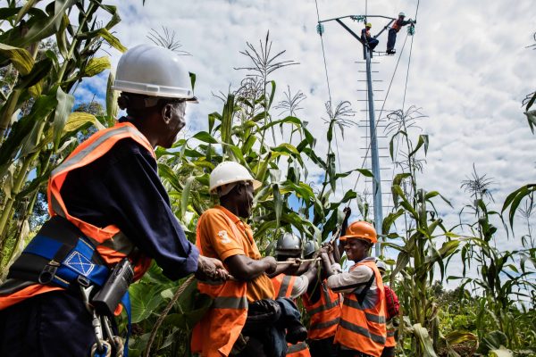 MATEBI, EASTERN DR CONGO, 18 NOVEMBER 2015: Congolese men lay electricity pylons for the power that will be supplied by Matebi Hydro-electric station. The powerstation is an initiative of Virunga National Park and when it comes online in early 2016, it will supply over 13 Kilowatts of power to the region. The nearest city is Goma, which uses a quarter of the power that will be created by Matebi. The electricity generated will be used to change the face on industry in the region as well as the daily lives of the population. The new opportunities this will provide for employment is also expected to be a game-changer for peace in this extremely impoverished region. (Photo by Brent Stirton/ Reportage for National Geographic Magazine.)